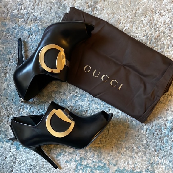 Gucci Shoes - New in box Authentic Gucci Black heels and zipper in back Size 35.5